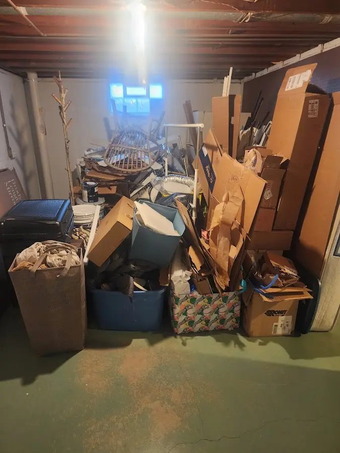 Roll-off dumpster container at job site for 2 Yard Dumpster Rental in Lantana